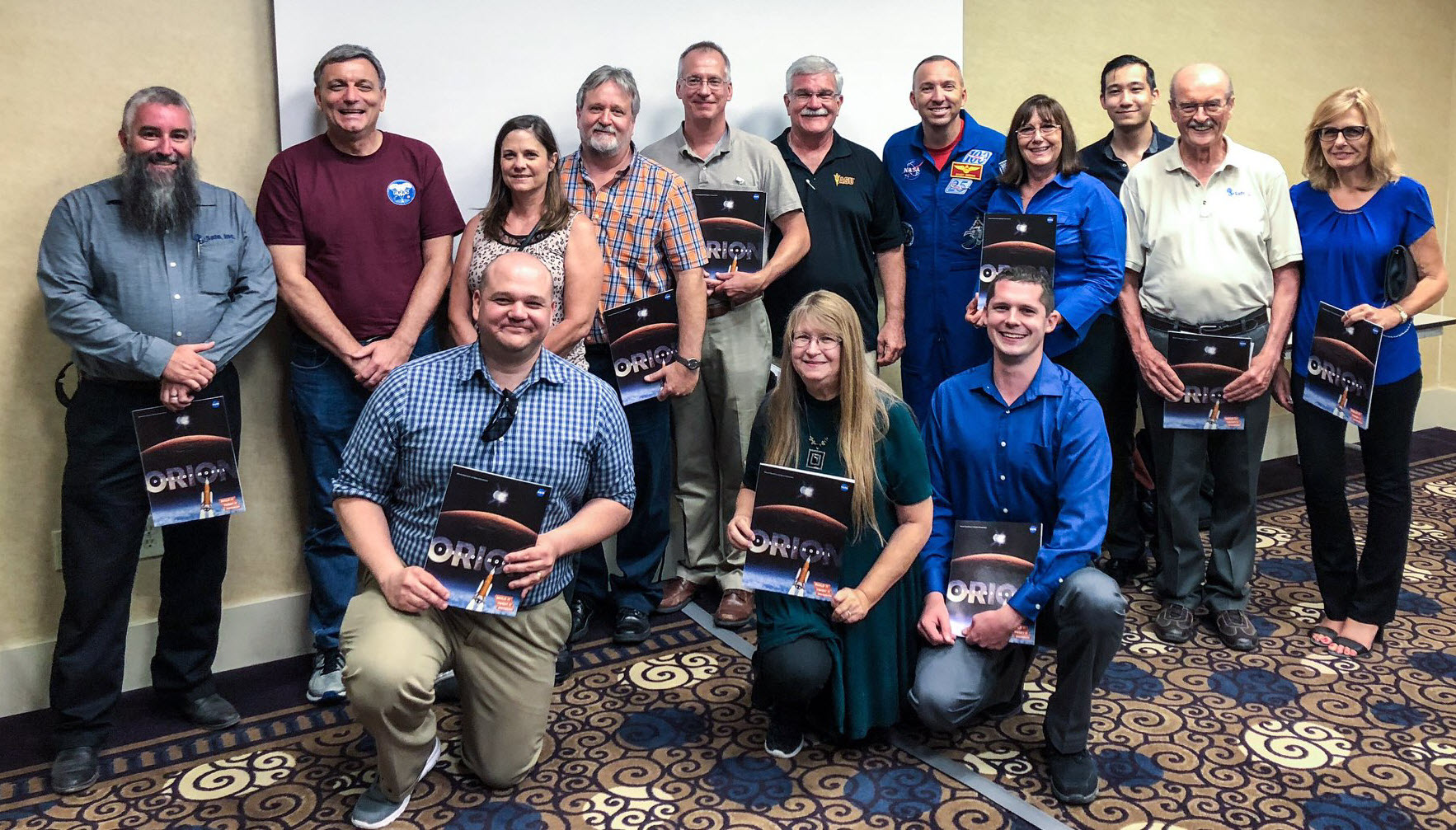 Safe team with NASA Orion Program Manager Mark Kirasich (back row, second from left) and NASA astronaut Randy Breznik (back row, fifth from right), at a special NASA/YPG meet-and-greet gathering, the day before the Orion parachute drop testing | Photo credit: NASA